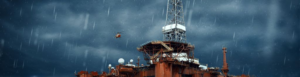A helicopter approaches an oil platform above crashing waves during a storm
