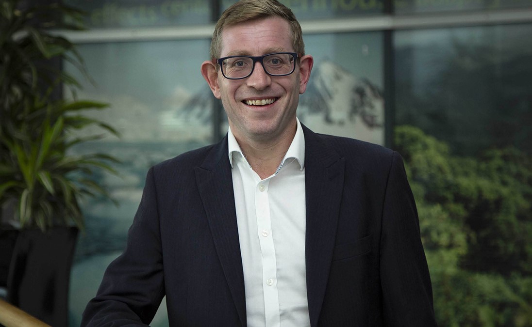 A corporate headshot of Simon Brown, Met Office Services Director.