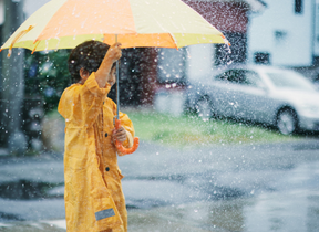 A child with an umbrella