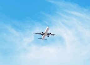 aeroplane-in-blue-sky-adobestock_359532281-smaller