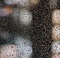 artificial-lights-reflected-in-raindrops