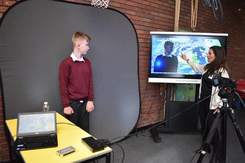 boy-with-claire-nasir-presenting-the-weather