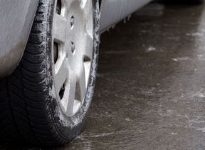 car-wheel-on-icy-road_adobestock_398765797