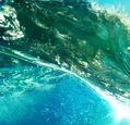 close-up-of-ocean-wave-reflecting-sunshine