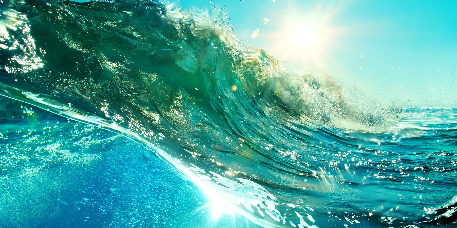close-up-of-ocean-wave-reflecting-sunshine