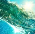 close-up-of-ocean-wave-reflecting-sunshine