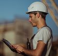 construction-worker-holding-ipad