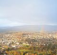 double rainbow over a town
