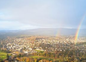 double rainbow over a town