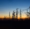 electricity-pylons-at-night