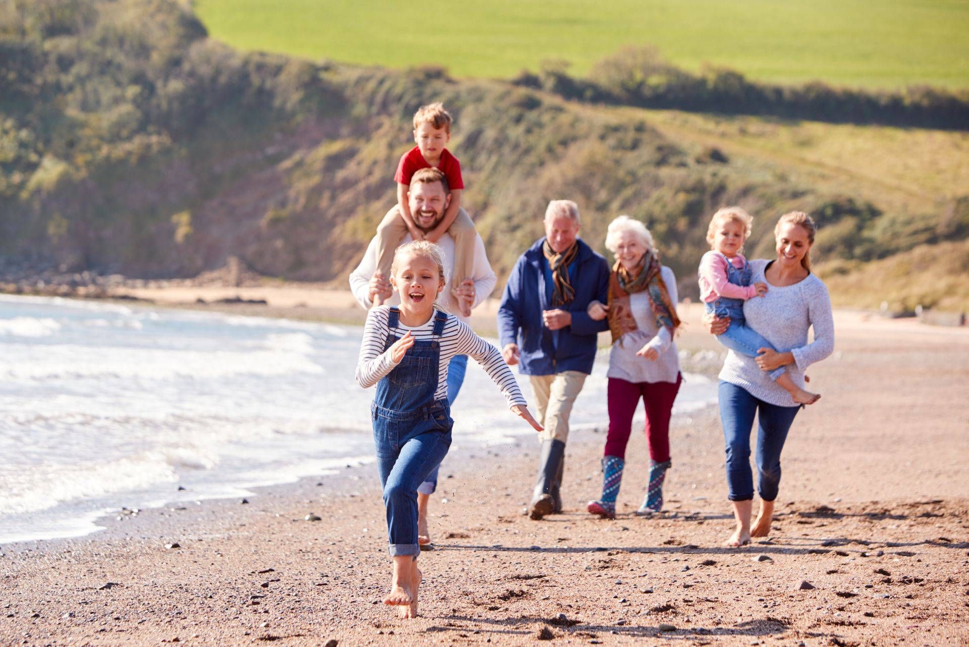 family-on-beach-adobestock_315678002