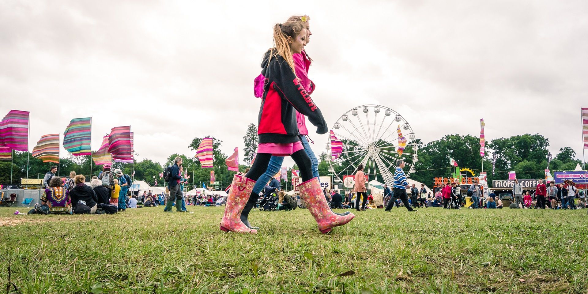 Festival goers walking in a field