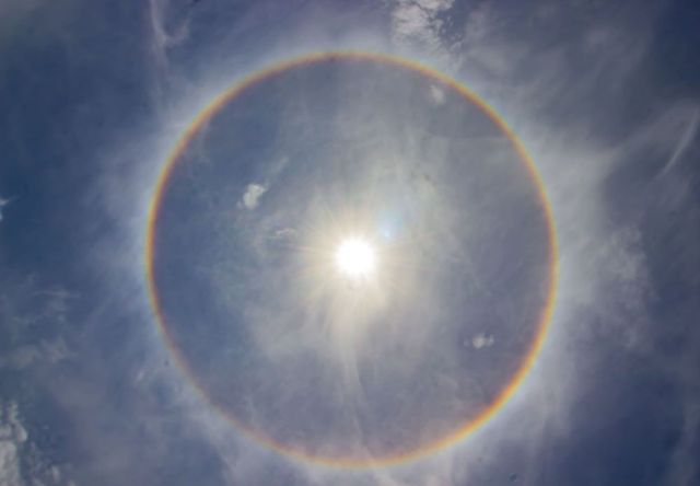 A full circle rainbow seen from an elevated viewpoint