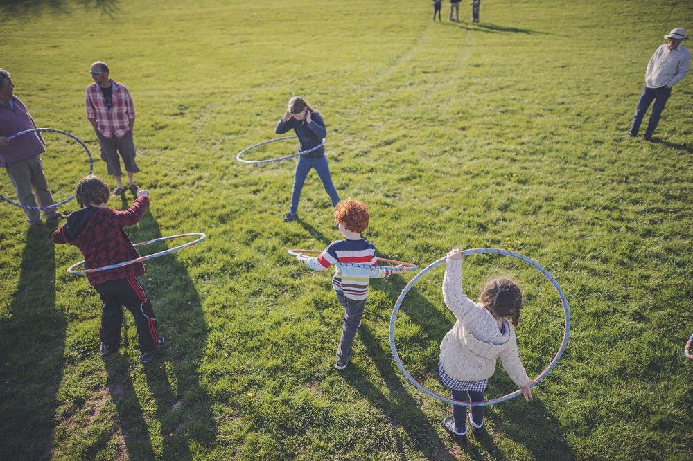 Children playing with hoola-hoops