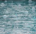 rain-falling-into-water