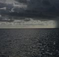rain-falling-on-the-horizon-over-the-sea-photo-brian-cook