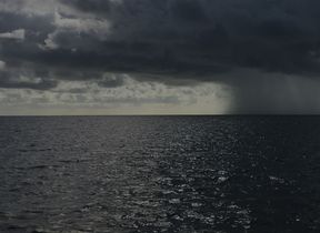 rain-falling-on-the-horizon-over-the-sea-photo-brian-cook