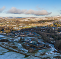 scattering-of-snow-across-a-valley