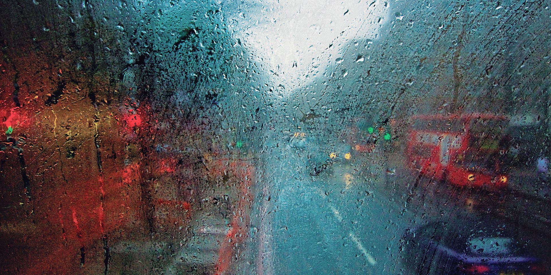 street-through-rainy-bus-window