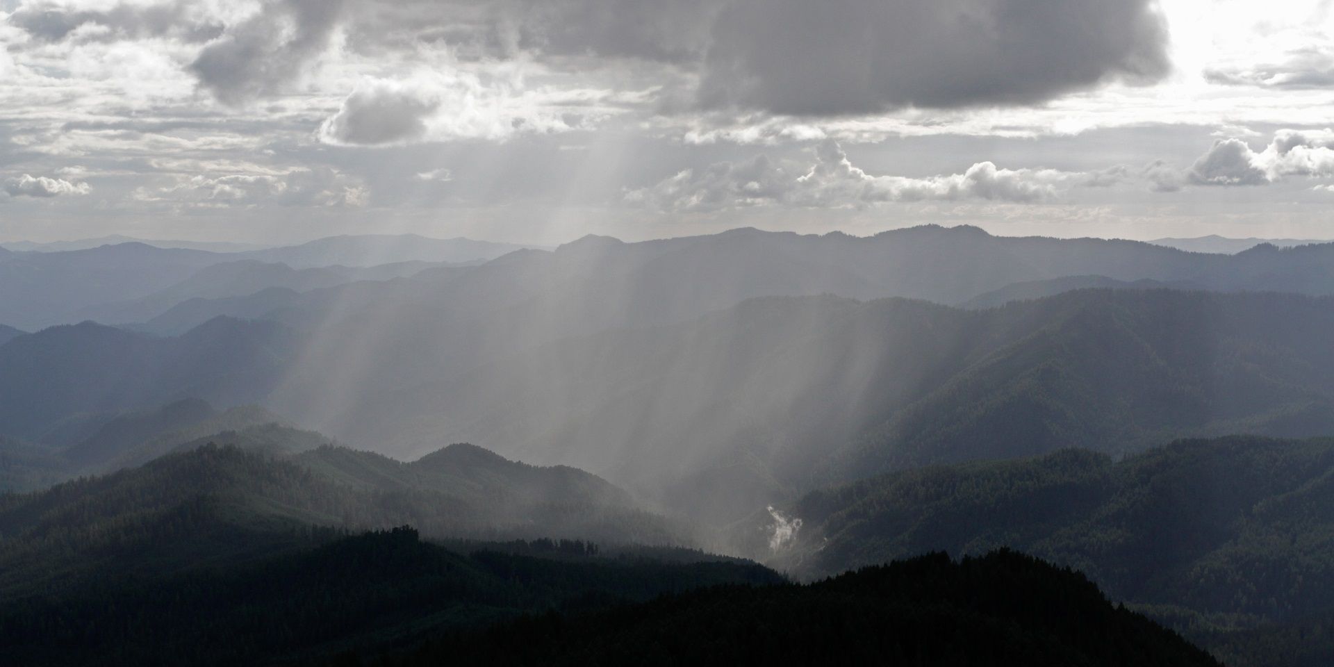 virga-clouds-over-hills