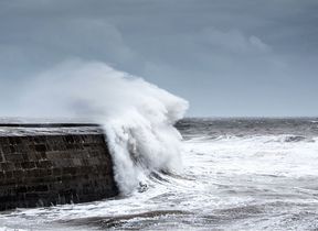 waves-crashing-against-a-harbour-wall