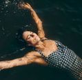 woman-floating-in-water