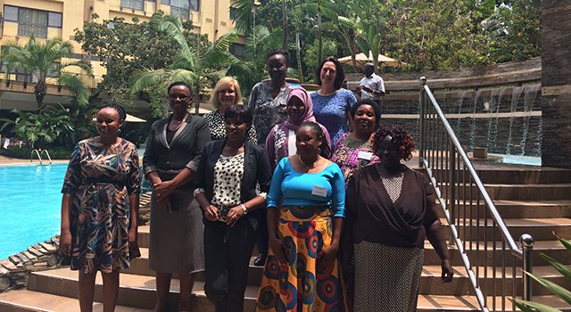 Catrina with attendees at a meeting in Kigali, Rwanda in 2019.