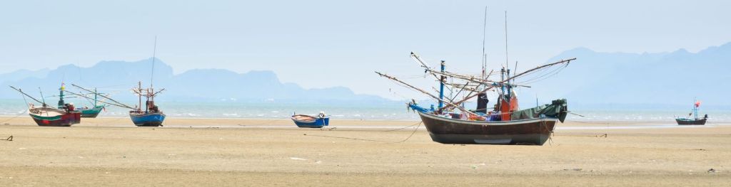 stranded fishing boats in India
