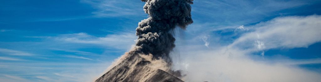 A volcano erupting ash A volcano erupting ash