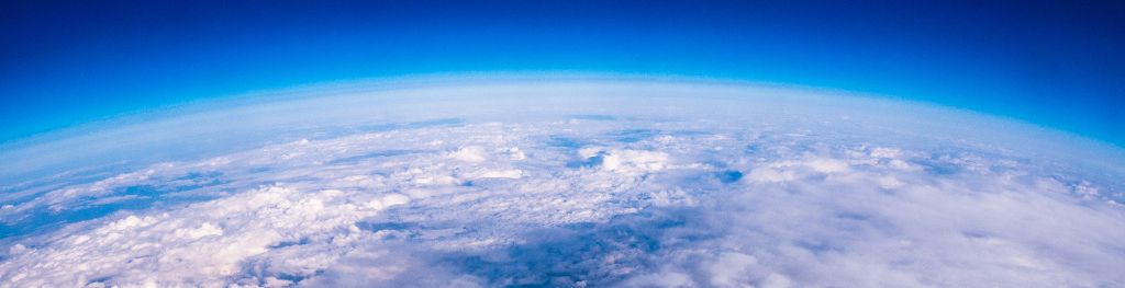 A view of clouds from the edge of the earth's atmoshpere.