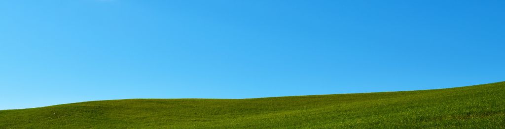 A single cloud in a blue sky
