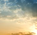 Sunshine showing through clouds in the sky