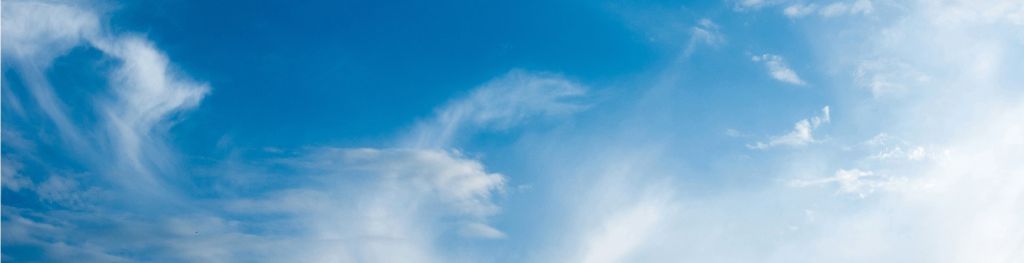 Wispy clouds in a blue sky