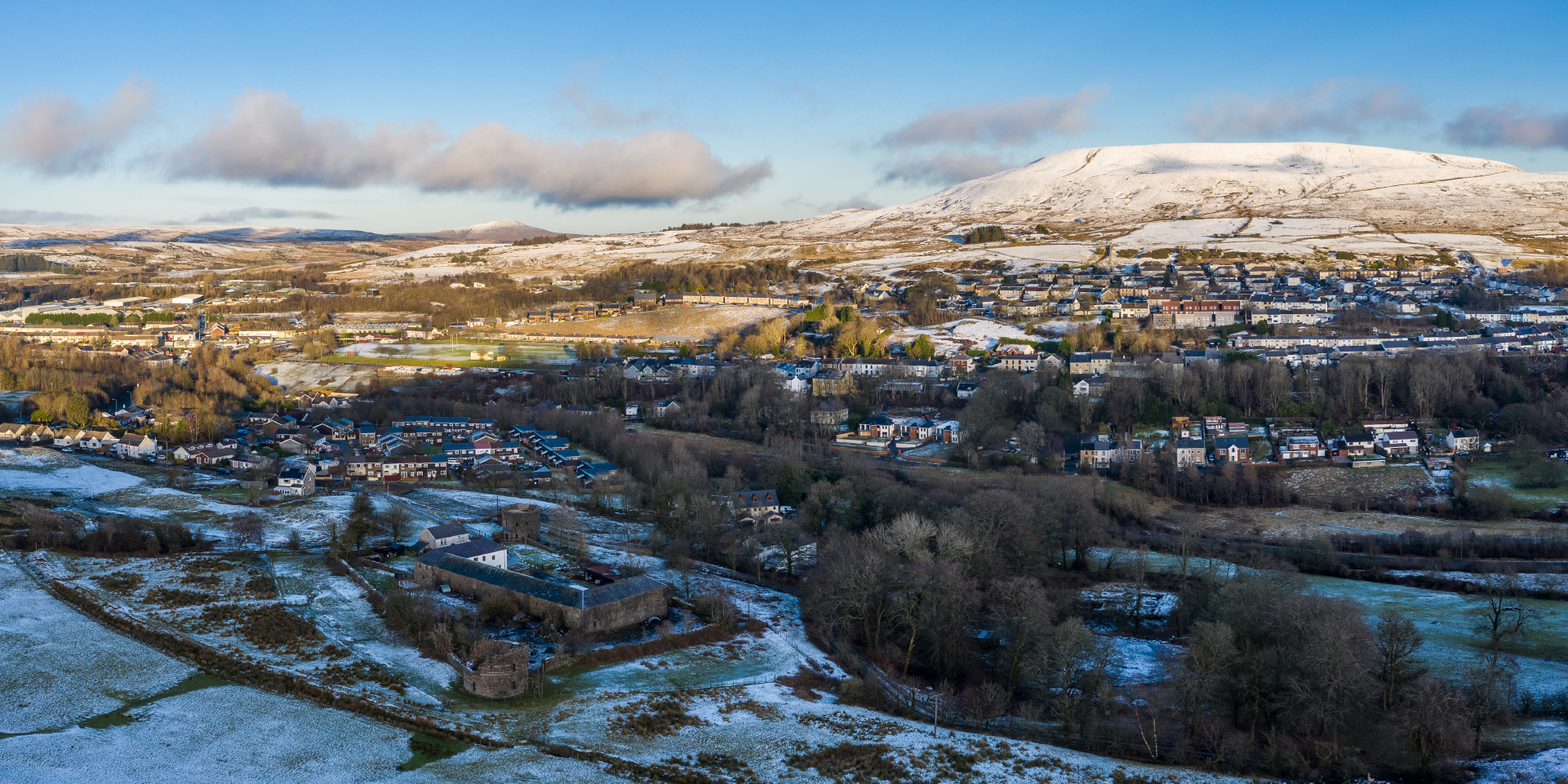 Scattering of snow across a valley