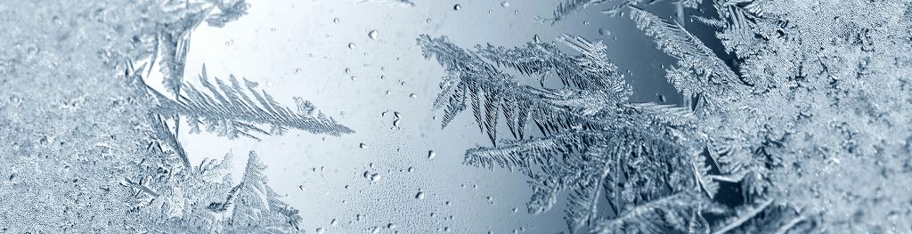 A frozen screen with ice crystals forming on both the left and right, and meeting in the middle.