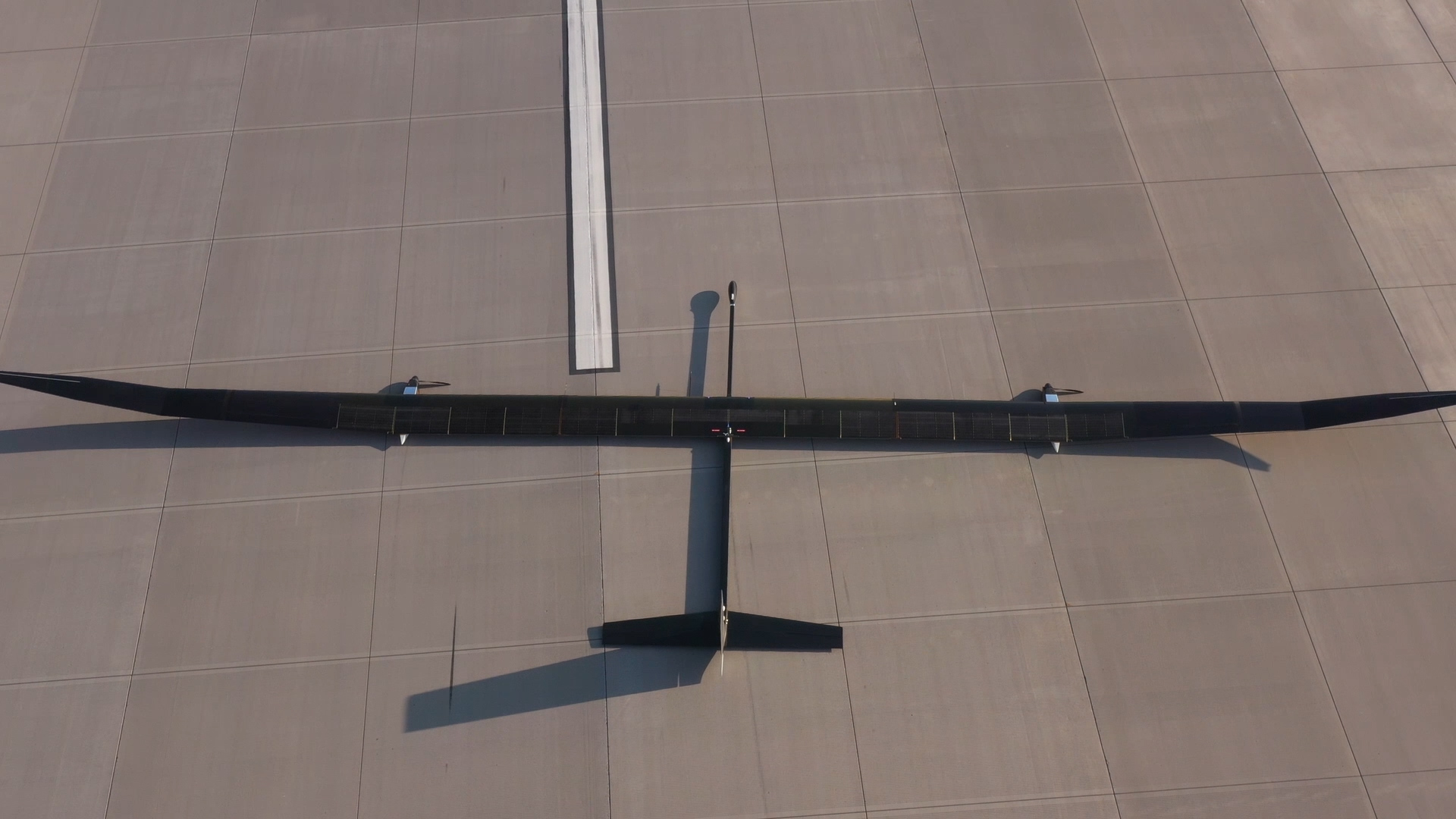 Top down image of the BAE Systems Prismatic PHASA-35 aircraft on a runway.