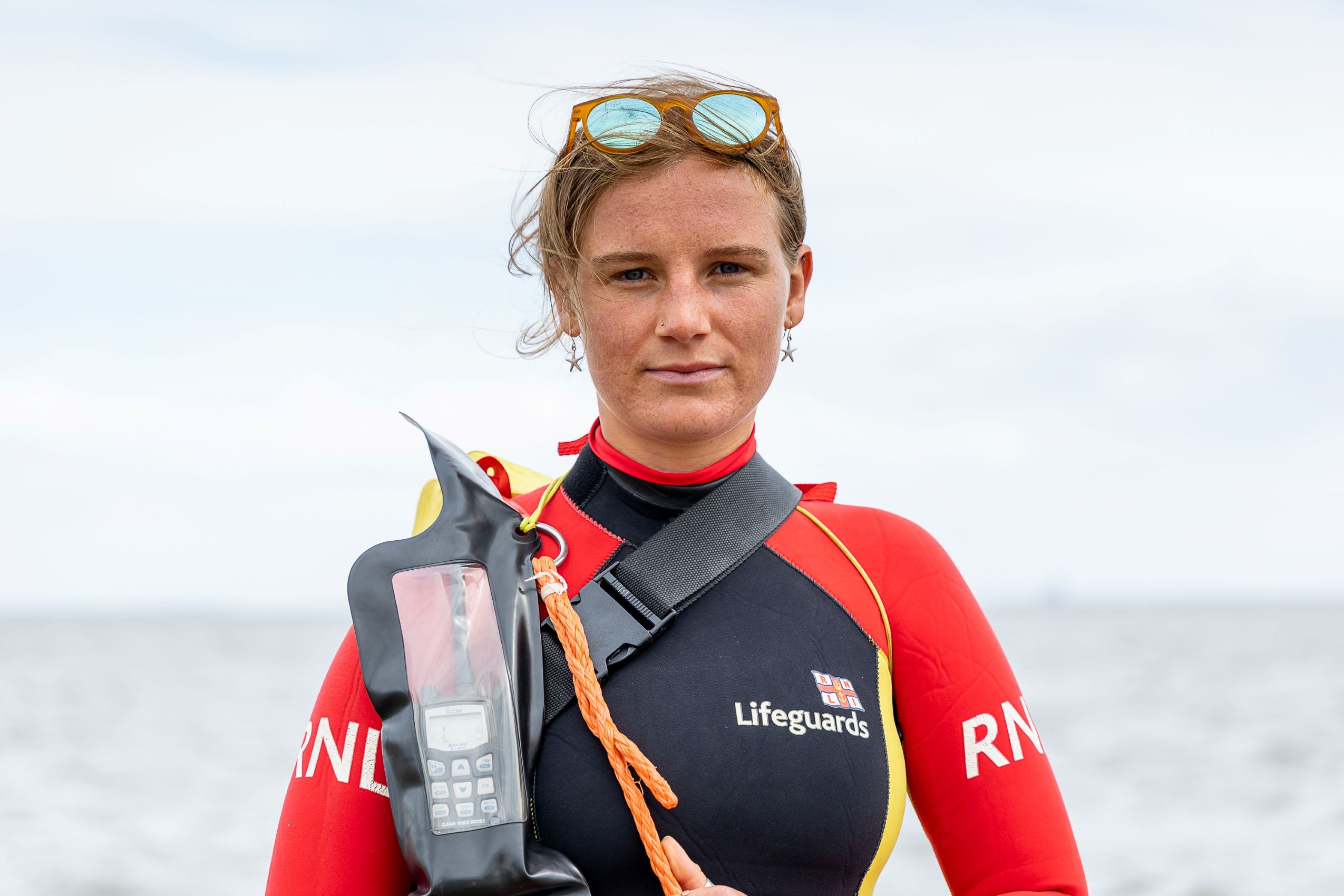 A headshot of Iona Hamilton, an RNLI Lifeguard