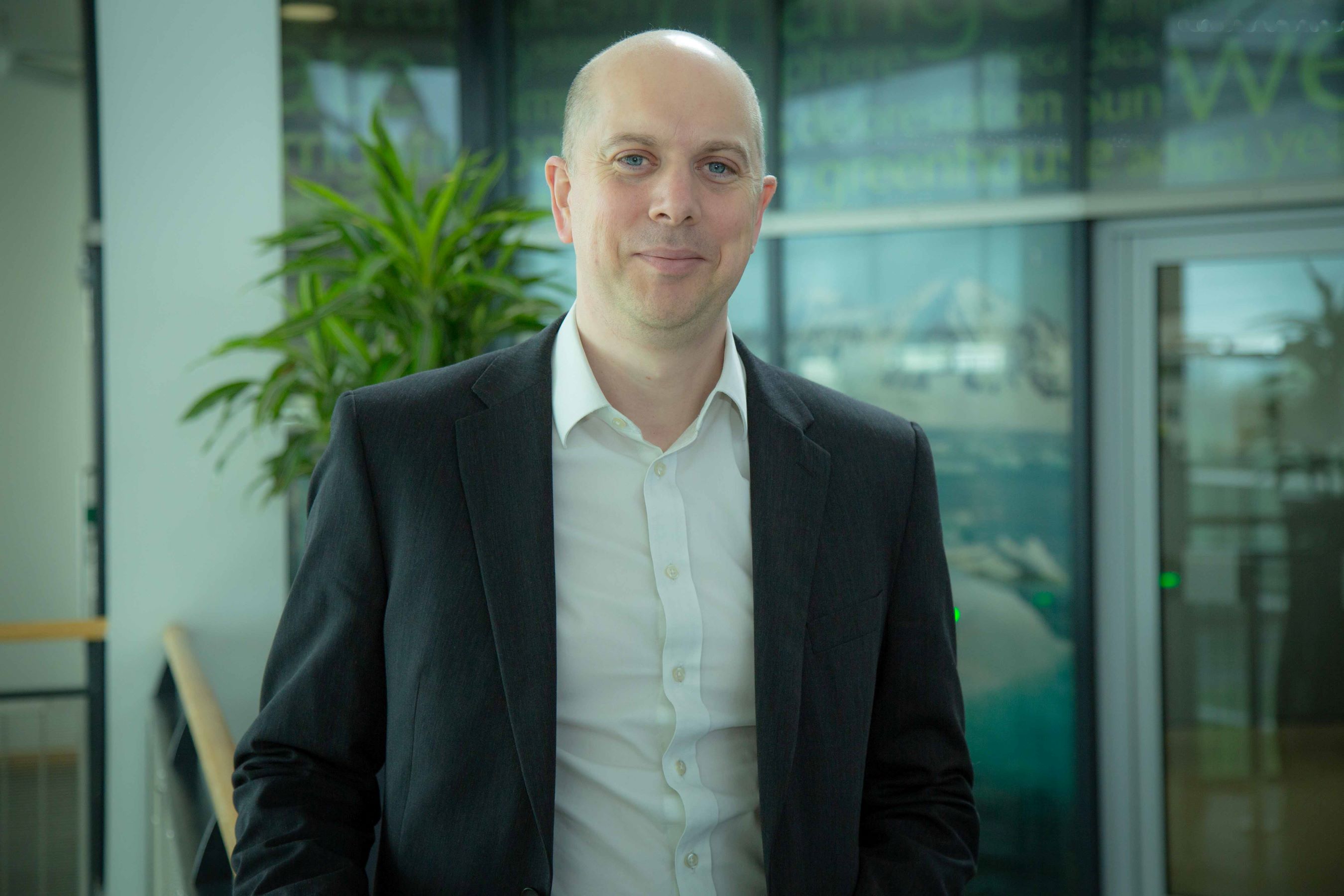 Corporate headshot of Adam Jackson, Met Office Non Executive Director