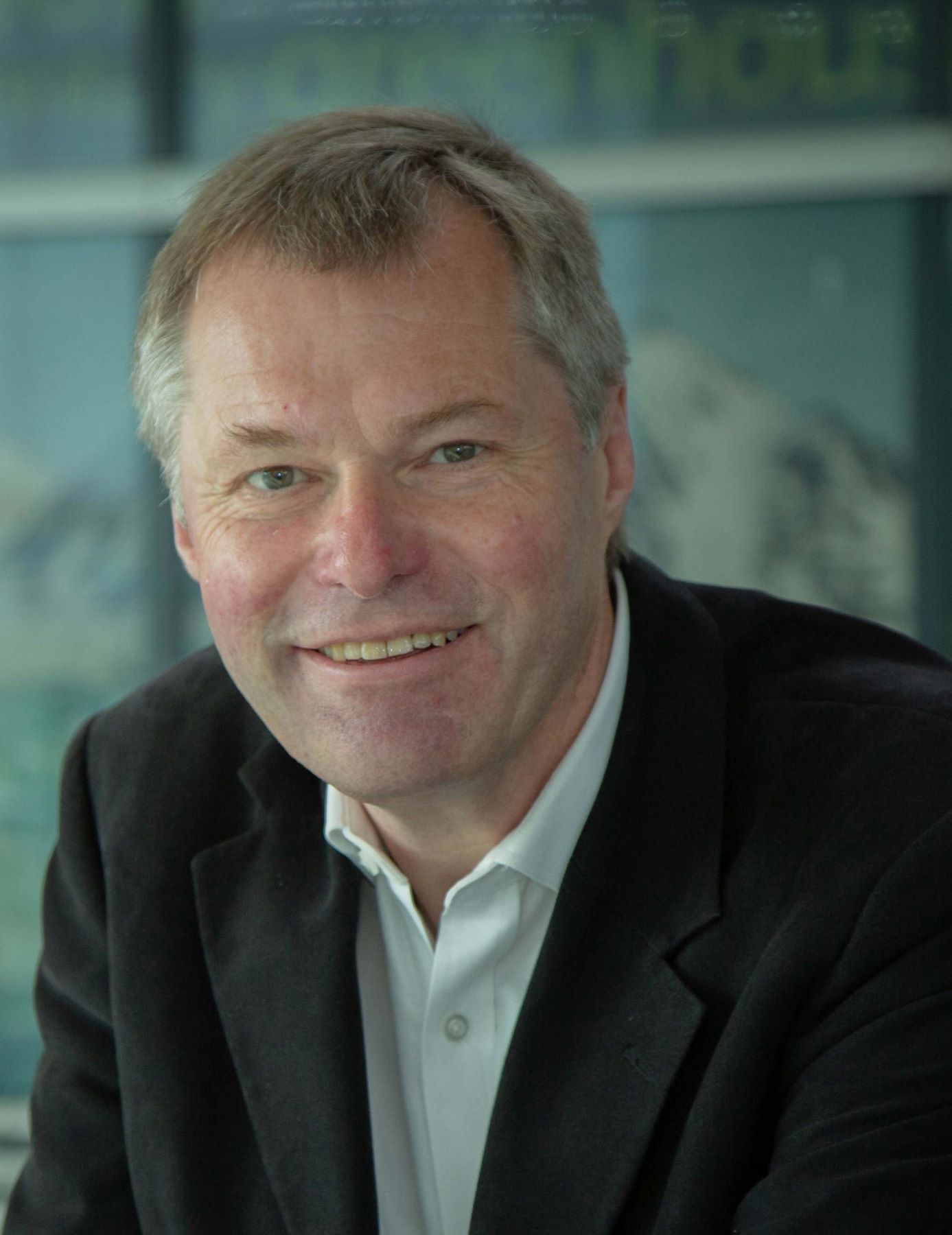 Corporate headshot of Rob Woodward, Met Office Non Executive Chair