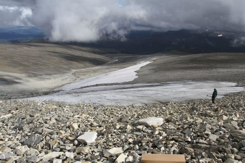 A valley with a receding glacier.