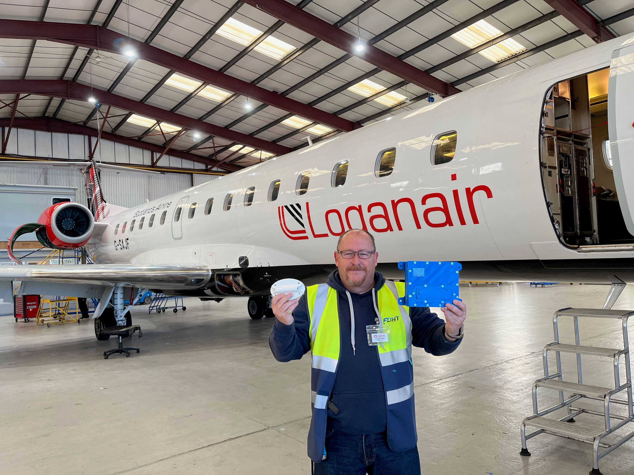 Loganair plane in hanger