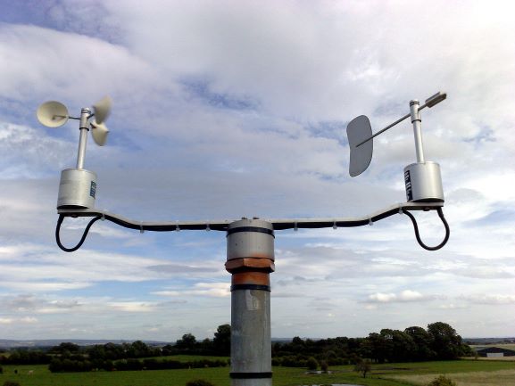 Cup anemometer and vane, with three cups above a vertical spindle, which rotates to measure wind speed