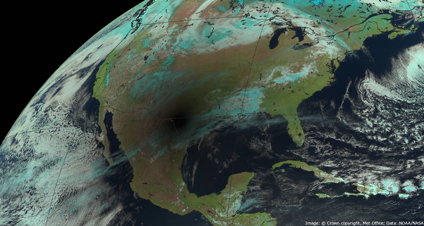 Geostationary satellite image showing dark spot of solar eclipse over North America