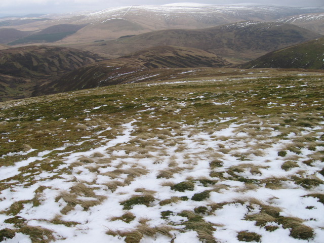 Snow melting on a field in Leadhills